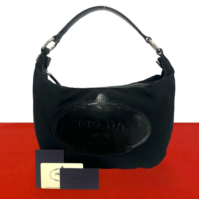 Prada Logo Stamp Tessuto Pocono Nylon Patent Shoulder Bag Black in Black Patent leather from The Reluxe