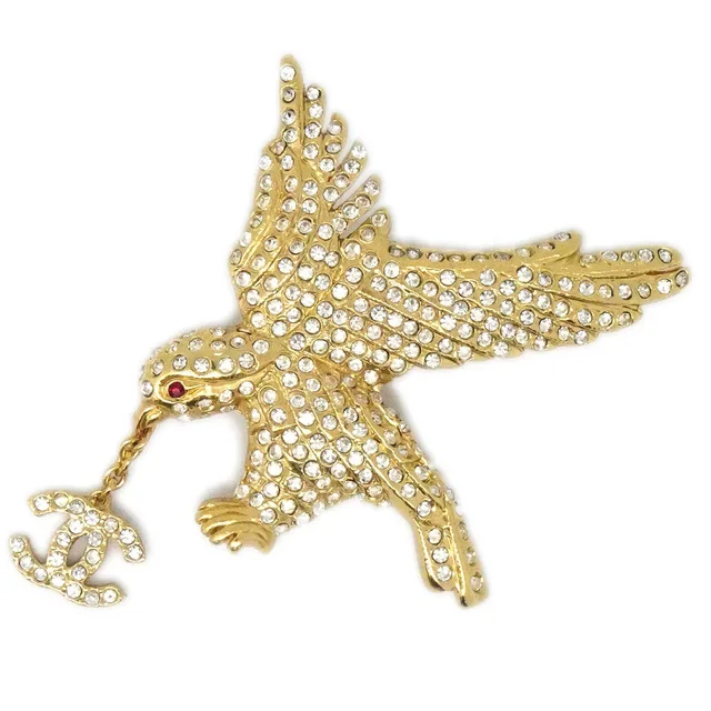 Chanel Eagle Rhinestone Brooch Pin Gold 01P in Gold from AMORE Vintage Tokyo