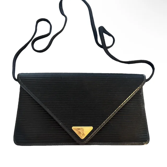 Saint Laurent Black Clutch in black|gold from Poshmark, photo 1 of 1