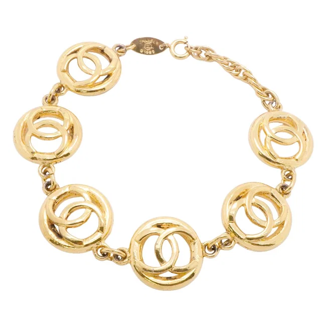 Chanel Bracelet Vintage CC Logo Round Circle Gold Plated in Gold from The Reluxe