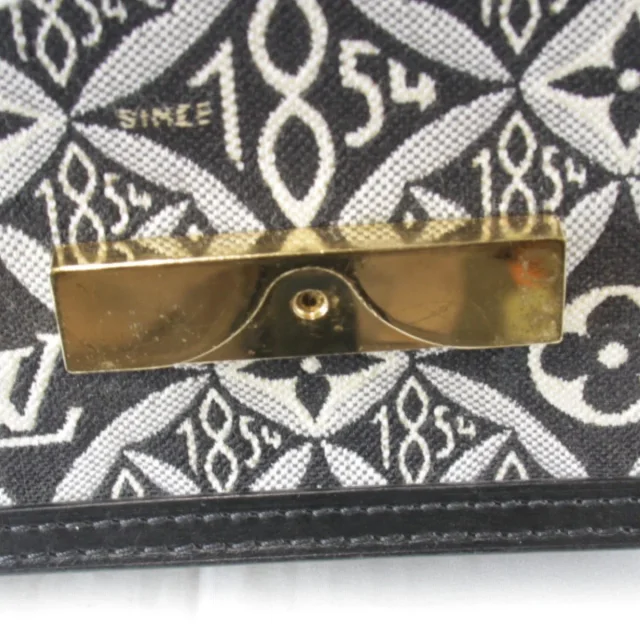 Louis Vuitton Jacquard Portefeuille Dauphine canvas leather shoulder bag in Black Canvas from LuxUness, photo 7 of 8
