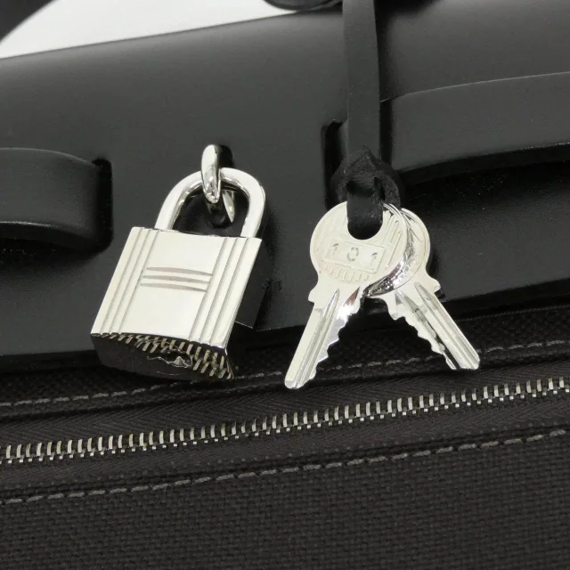 Hermès Herbag Zip PM Toile Military Vache Hunter Bag in Black Calfskin from LuxUness, photo 5 of 9