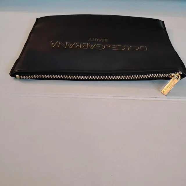 Dolce & Gabbana Women's Clutch bags - Black/Gold in gold|black from Depop, photo 8 of 9