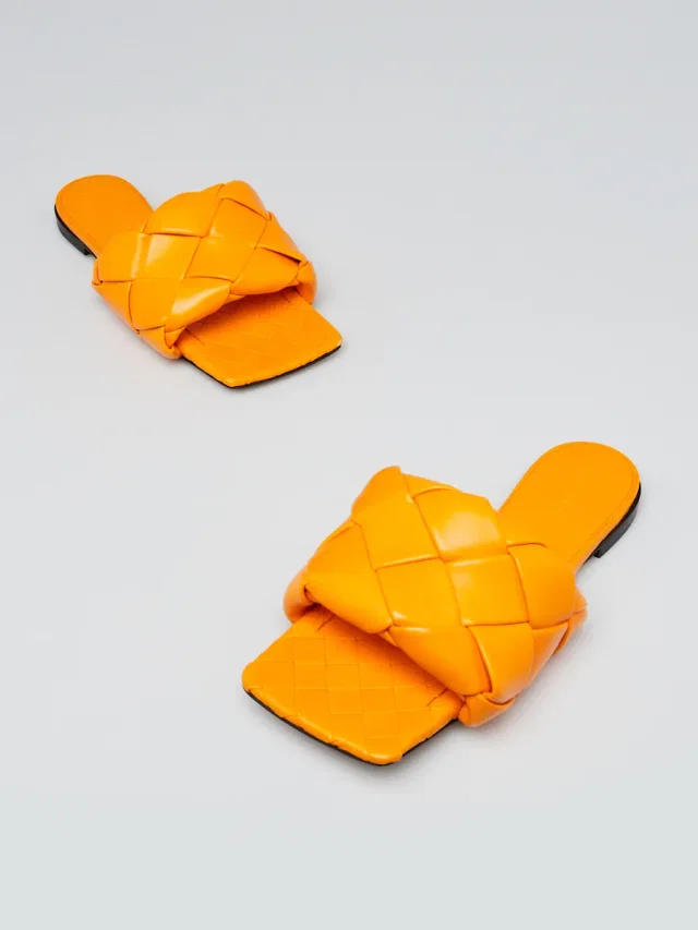 Bottega Veneta Orange Woven Leather Lido Flat Sandals 5. /36 in Orange Woven leather from Yoogis