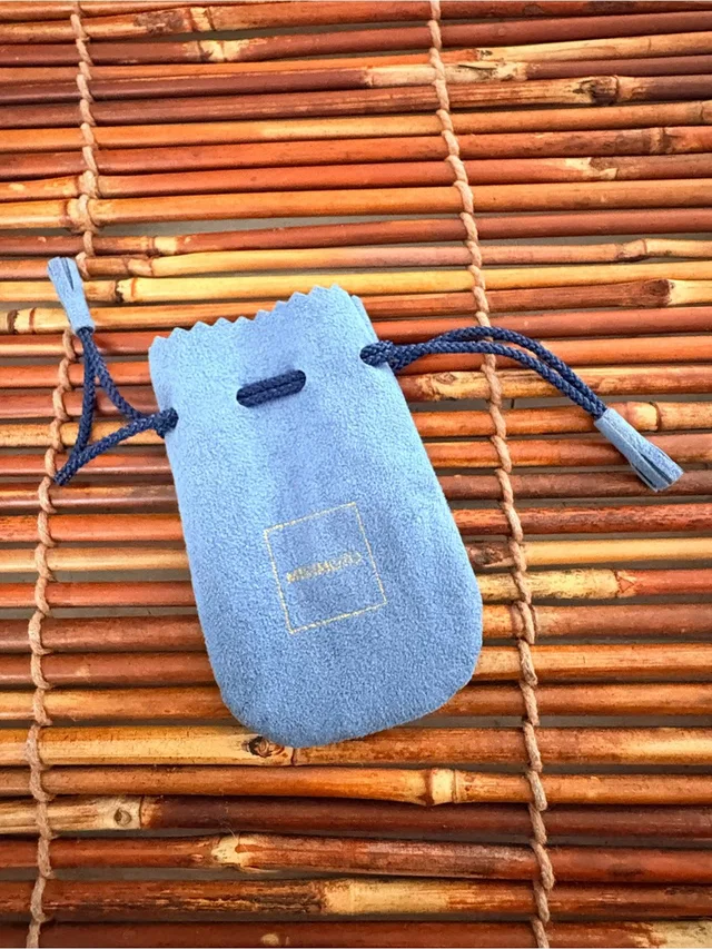 Mikimoto Powder Blue Suede Drawstring Jewelry Pouch in gold|blue Suede from Poshmark