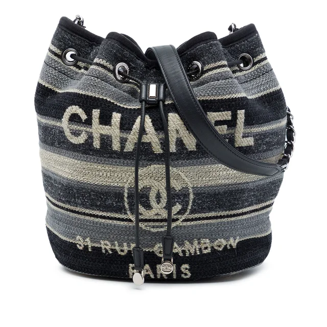 Gray Chanel Canvas and Wool Striped Deauville Drawstring Bucket Bag in Grey Canvas from Designer Revival, photo 1 of 1