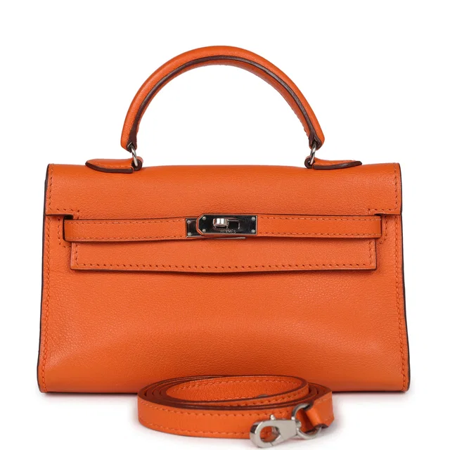 Hermès Micro Kelly 15 Orange Swift Palladium Hardware in Orange Swift leather from Madison Avenue Couture