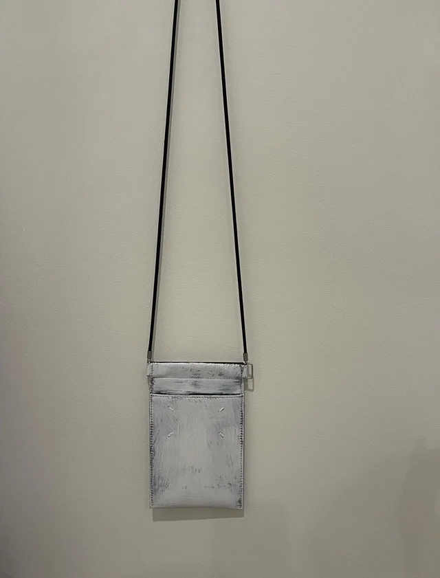 Maison Margiela Phone Bag in white from Grailed
