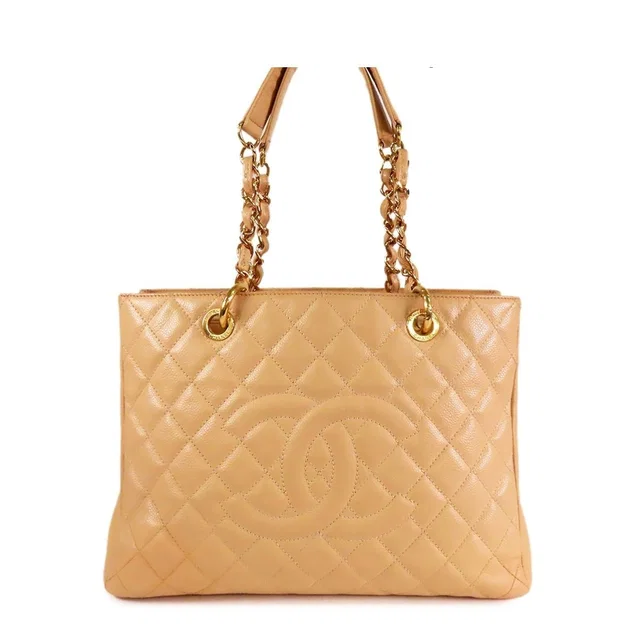 Chanel Grand Shopping Tote GST Beige Gold Caviar Leather Shoulder Bag in Beige Caviar leather from The Reluxe