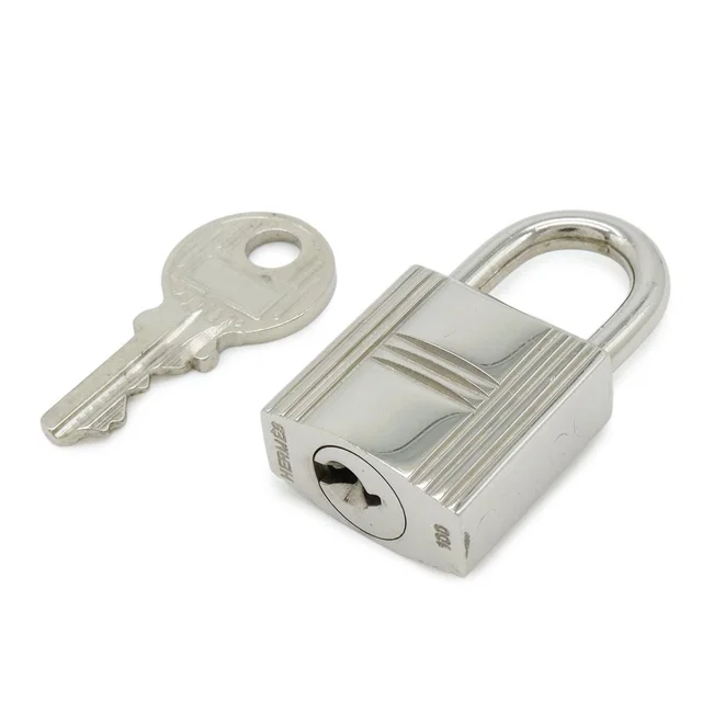 Hermès Cadena Padlock Key with Metal Silver in Silver from The Reluxe