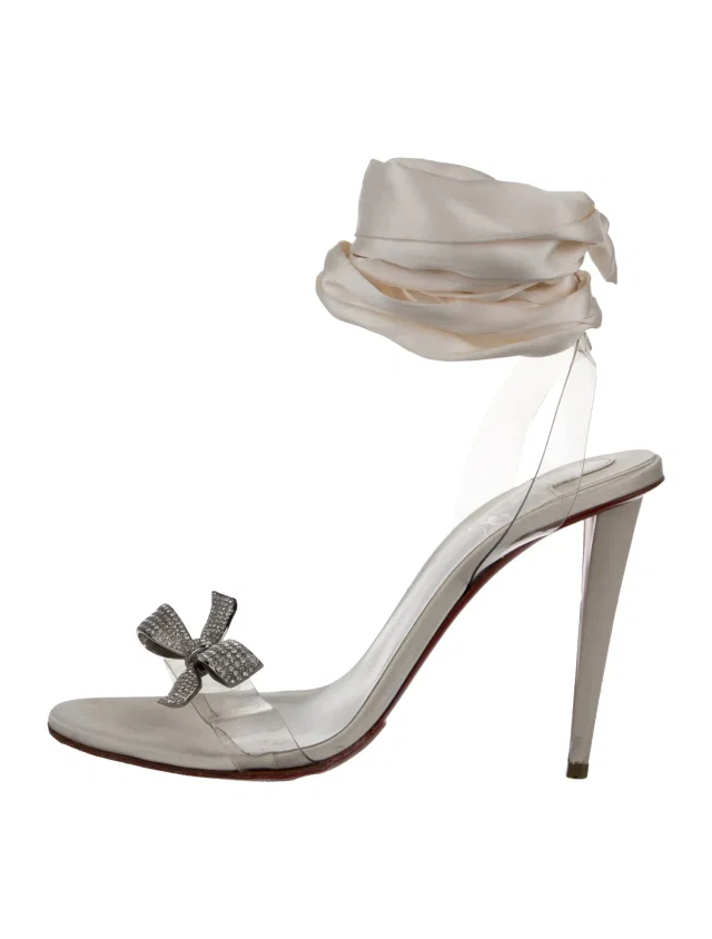 Christian Louboutin PVC Bow Accents Sandals in silver|gray Satin from The RealReal