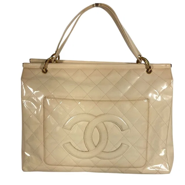 Chanel Handbag Quilted CC Logo Patent White in White Patent leather from The Reluxe