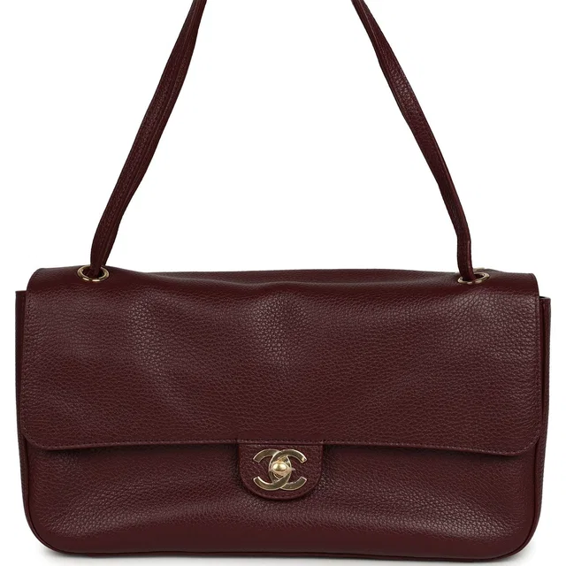 Chanel Maxi "Souplissimo" Small Flap Bag Dark Burgundy Grained Calfskin Gold Hardware in Burgundy Caviar leather from Madison Avenue Couture