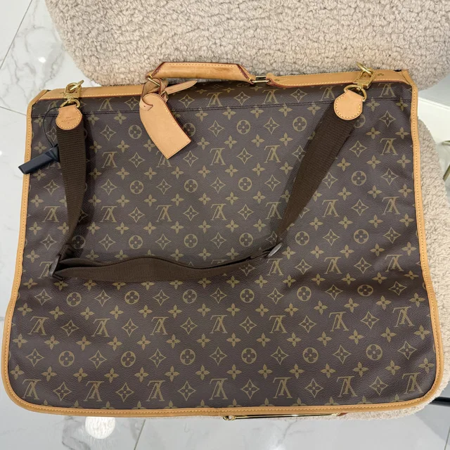 Louis Vuitton Monogram Portable Garment Bag in Canvas, coated canvas, Leather, Metal from Reowned