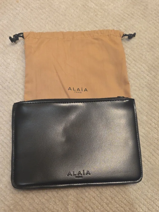 Alaïa Alaa Black Leather Zip Pouch in black|brown|neutral Leather from Poshmark