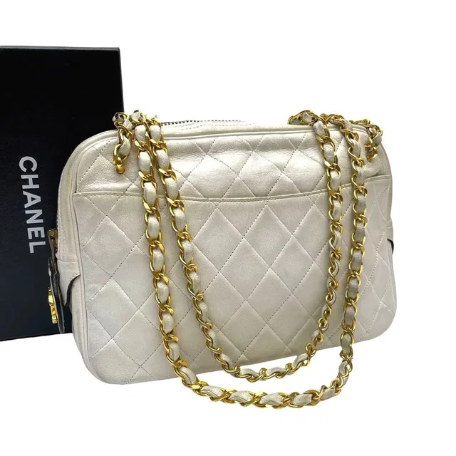 Chanel Quilted Lambskin Chain Shoulder Bag White Coco in White Lambskin from The Reluxe