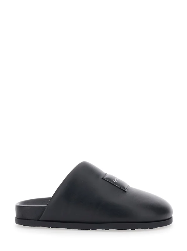 GIVENCHY Black Mules with Asymmetrical Design and Padded Leather Logo Women in Black 100% Lamb, photo 2 of 8 from Gaudenzi Boutique