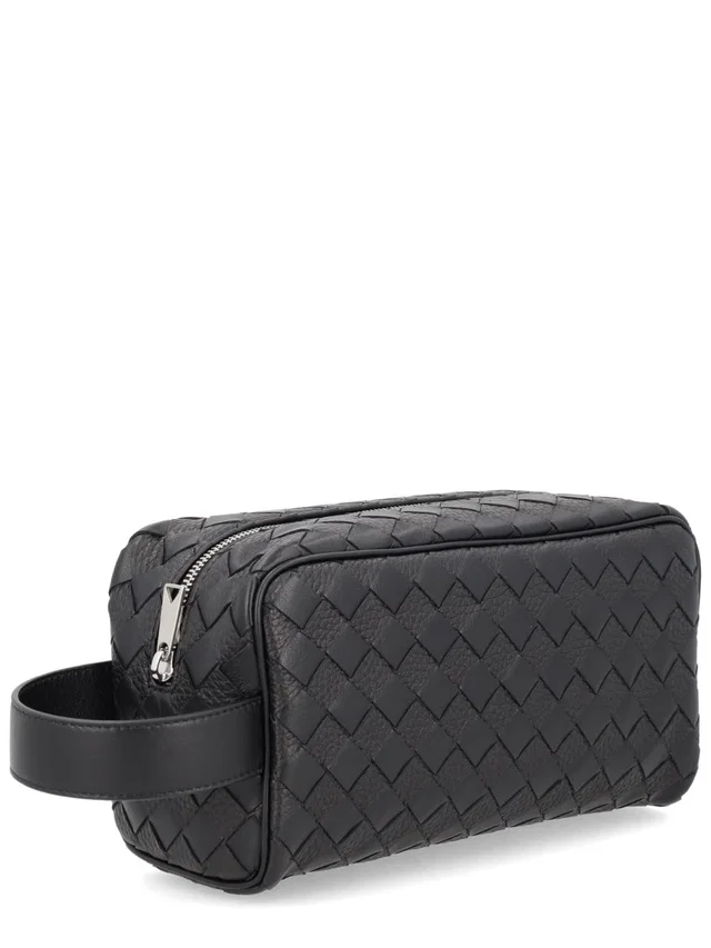 Bottega Veneta Woven Leather Clutch — Black in Black Woven leather from HEWI