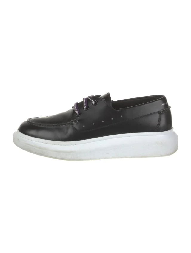 Alexander McQueen sneakers & athletic in black Leather from The RealReal