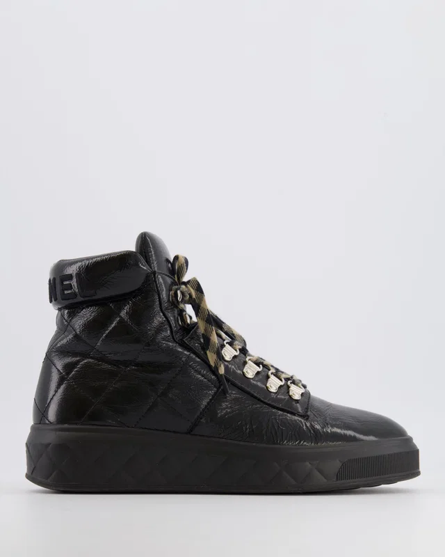 Chanel Black Quilted Calfskin Leather Boots with Embroidered Back Logo and Beige and Black Laces Size… in Black Calfskin from Sellier