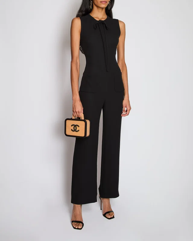 Chanel Black Sleeveless Jumpsuit with CC Button, Pocket and Neck Tie Detail Size FR 34 (UK 6) in Black Silk from Sellier