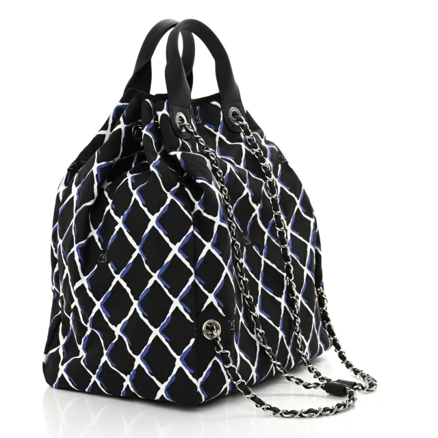 Chanel Printed Airline Drawstring Bag Black Blue in Black Canvas from FASHIONPHILE, photo 2 of 12