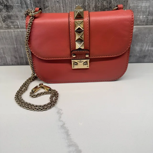 Valentino Garavani Coral Red Leather Chain Crossbody in red Leather from Poshmark, photo 1 of 1