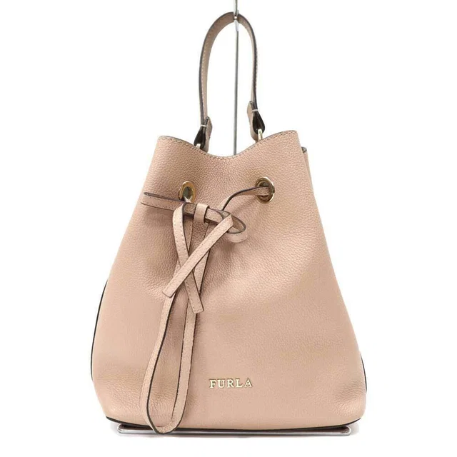 Furla Handbag Pink Beige in pink from Poshmark