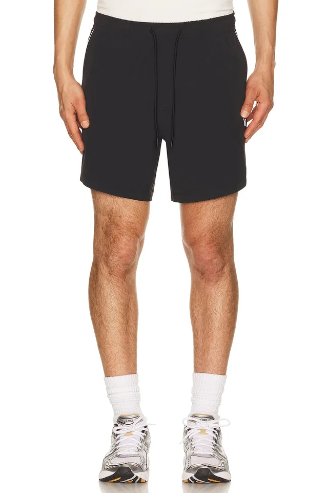 Vuori Crosscourt Unlined 7" Short in Black from REVOLVE (Canada), photo 1 of 1