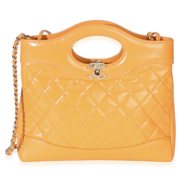 Chanel Orange Shiny Crumpled Quilted Calfskin Mini 31 Shopping Bag Leather Handbag in Orange Calfskin from HEWI