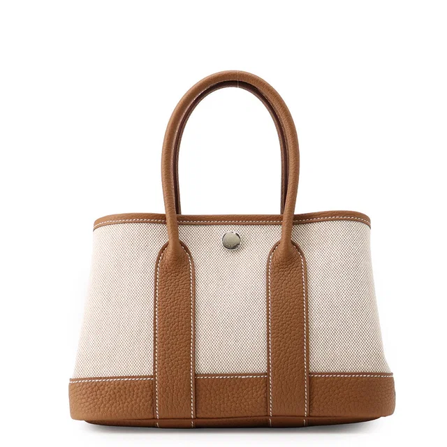 Hermès Neo Garden Ecru/Gold Toile H Negonda Leather Size 23 in Gold Leather from GALLERY RARE