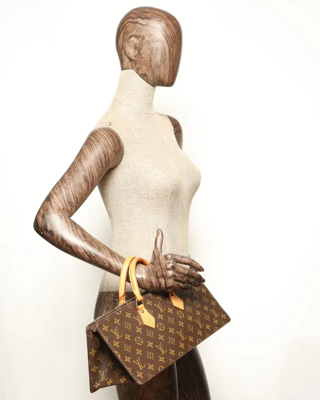 Louis Vuitton Monogram Sac Triangle Bag in Coated canvas from A Retro Tale, photo 10 of 11