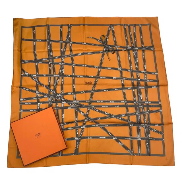 Hermès Scarf Carre 90 Bolduc Ribbon Pattern Orange in Orange Silk from The Reluxe