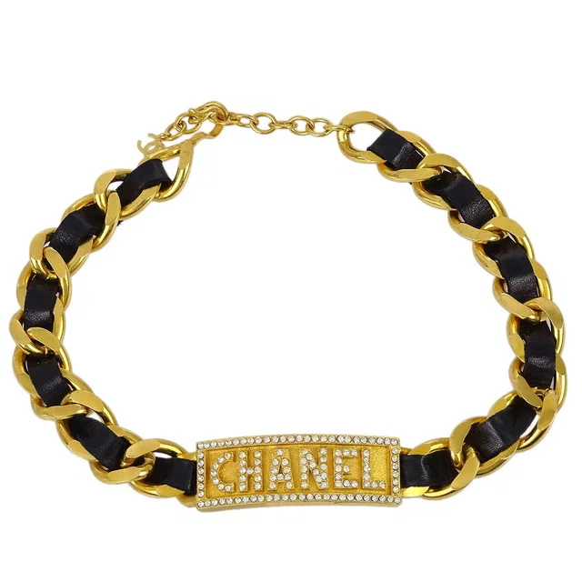 Chanel 1995 Black & Gold Logo Plate Choker in Black Leather from AMORE Vintage Tokyo