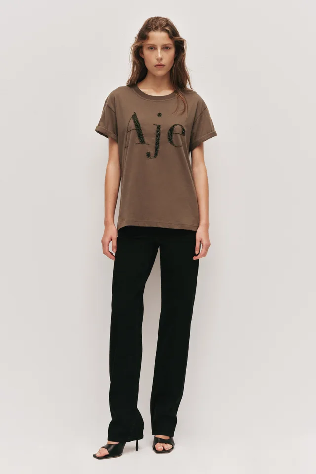 AJE Clover Logo Tee in Beige from Aje, photo 1 of 1