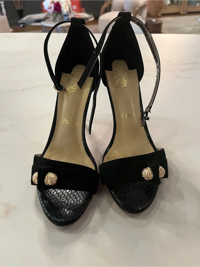 Christian Louboutin Black Suede & Black Snakeskin Gold-Accent Heels in black|gold Suede from Poshmark