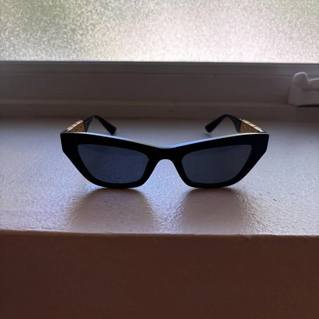 Versace Women's Sunglasses - Black in black from Depop, photo 1 of 1