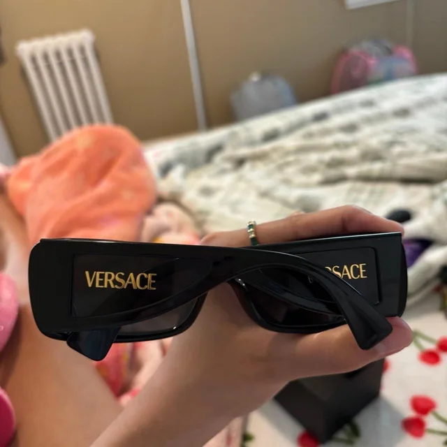 Versace Women's Oversized Sunglasses - Black in black from Depop, photo 8 of 9