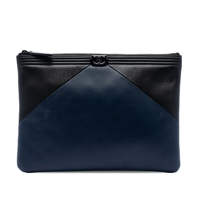 Blue Chanel Medium Bicolor Lambskin Boy O Case Clutch in Blue Lambskin from Designer Revival, photo 1 of 1