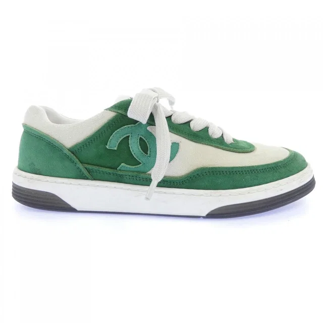 Chanel Sneakers White in White Calfskin from The Reluxe