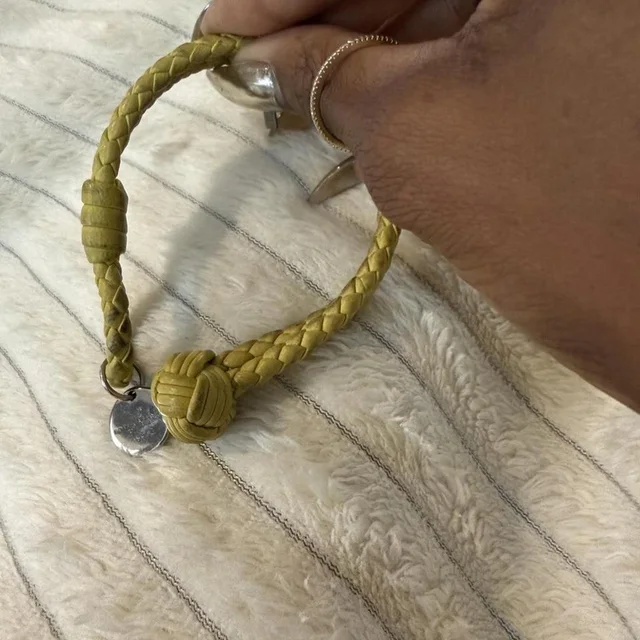 Bottega Veneta Women's Bracelet - Yellow/Gold in yellow|gold from Depop, photo 1 of 1