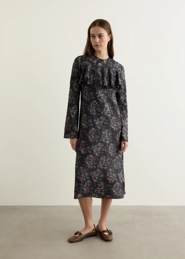 Ganni Shibori Pleat Midi Longsleeve Ruffle Dress in Black from Incu, photo 1 of 1