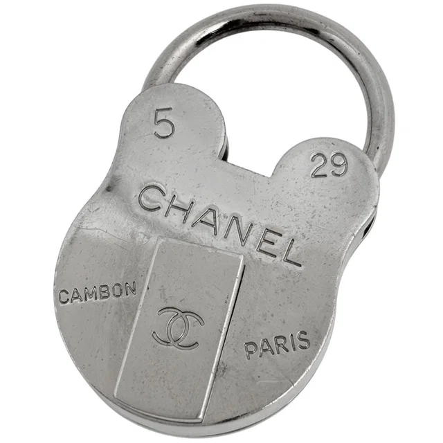 Chanel Charm CC Logo Padlock Metal Silver Keychain in Silver from The Reluxe