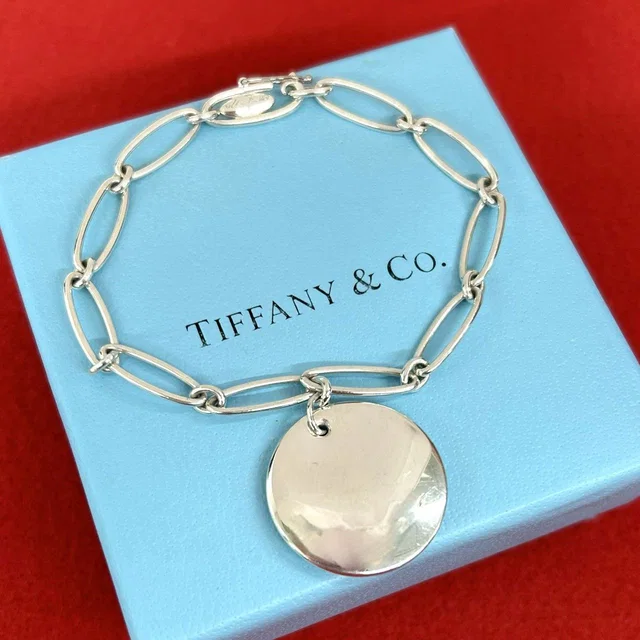 Tiffany & Co. Vintage Elsa Peretti Round Tag Bracelet 925 Sterling Silver in Silver from The Reluxe