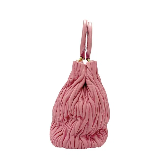 Miu Miu Handbag Leather Pink Matelasse in pink Leather from Poshmark