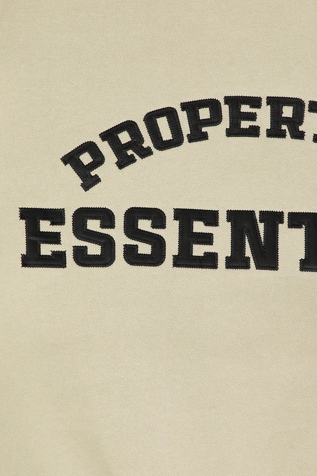 Fear of God ESSENTIALS Property Lounge Crewneck Sweatshirt in Seal, photo 5 of 5 from REVOLVE (Canada)