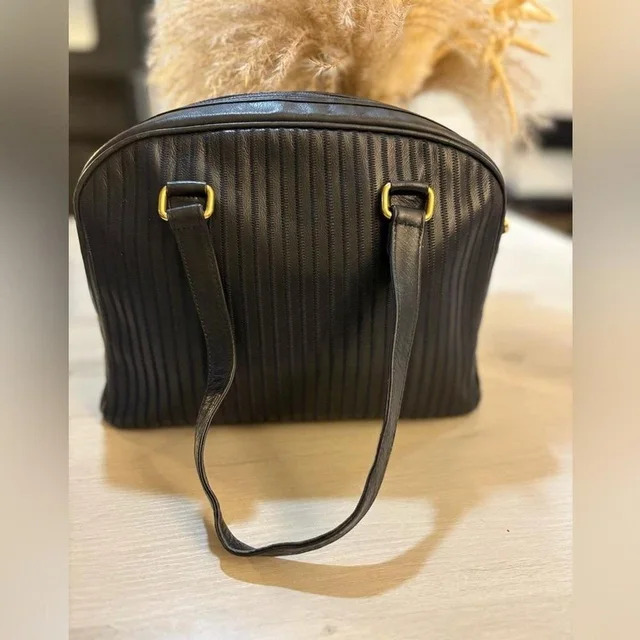 Fendi Women's Bag - Black/Gold in black|gold from Depop, photo 1 of 1