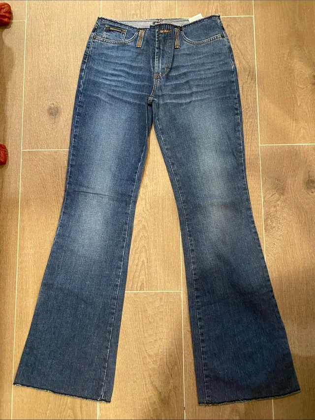 Dolce & Gabbana Vintage Medium Wash Flare Jeans in blue Denim from Poshmark