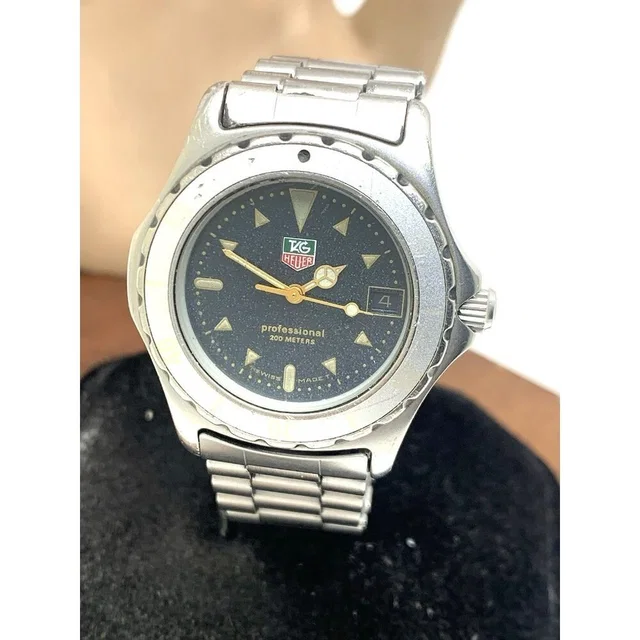 TAG Heuer Watch 972.613r Swiss Quartz Vintage Black Dial Silver Steel 34mm Used in silver|black|gray from Poshmark, photo 1 of 1