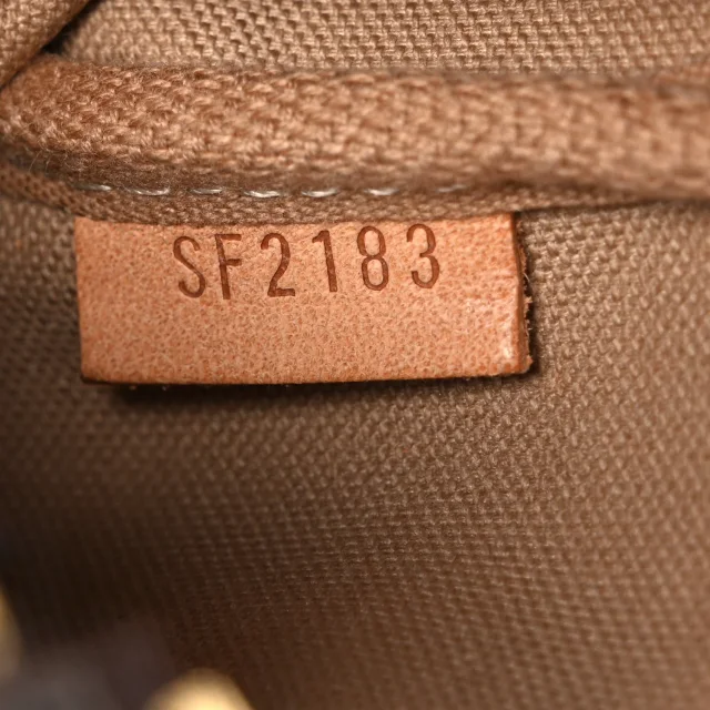 Louis Vuitton Monogram Trunks and Locks Mini Pochette Accessories in Canvas from FASHIONPHILE, photo 7 of 7
